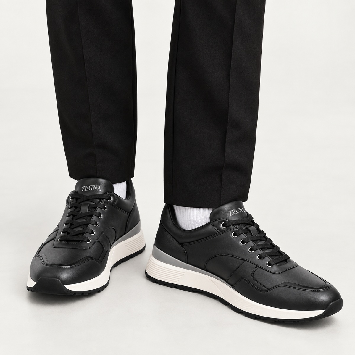 Sneakers noires Zegna à semelle blanche
