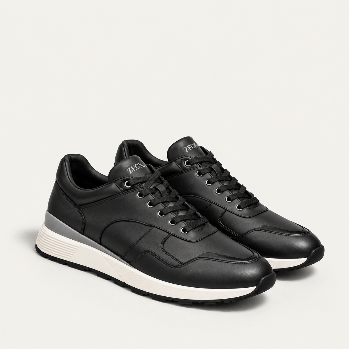 Sneakers noires Zegna à semelle blanche